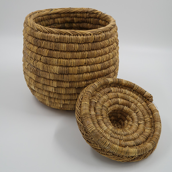 small wicker basket with lid