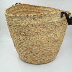 Low wicker basket with leather handles